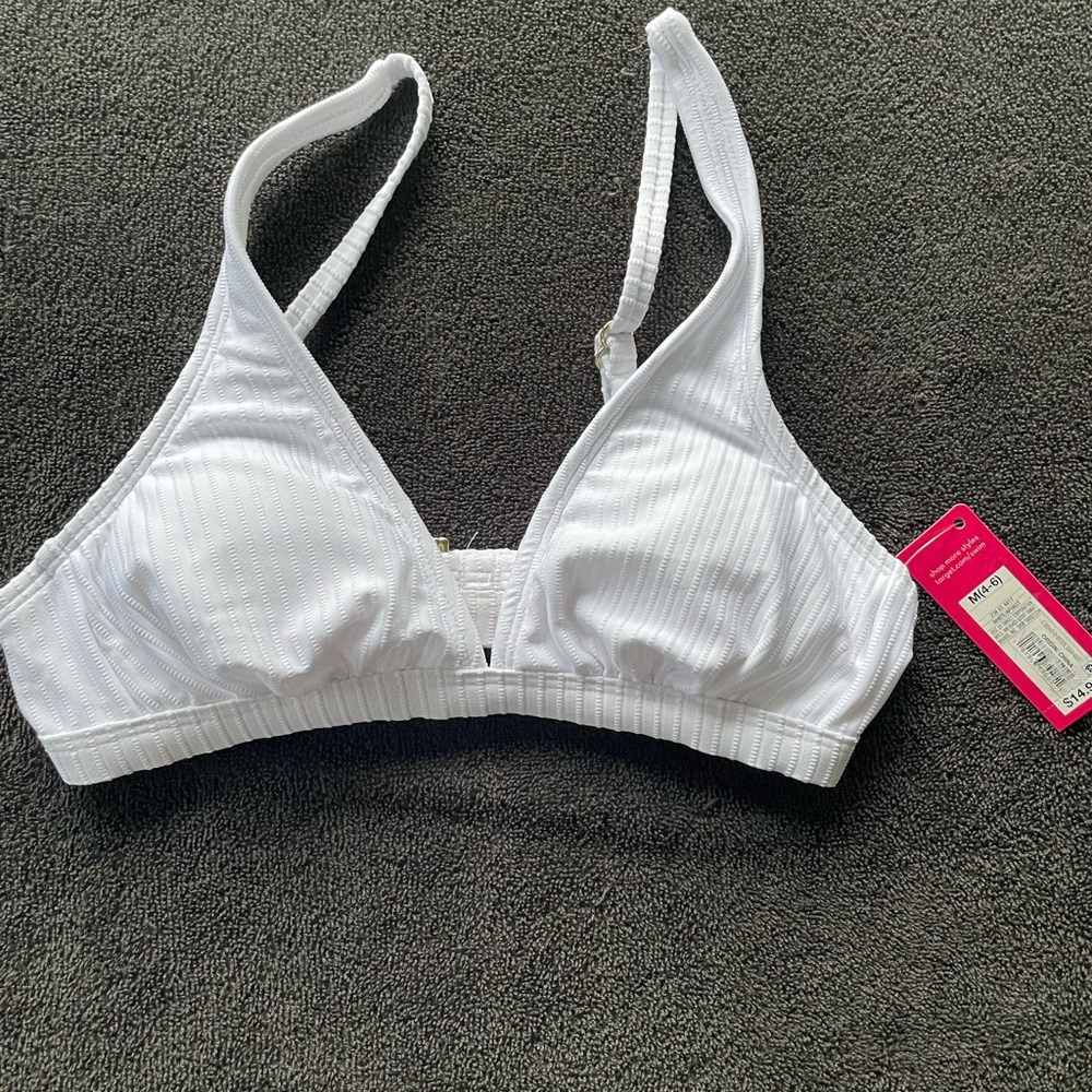 Brand new with tags white bikini top from Xhilaration size medium 4-6